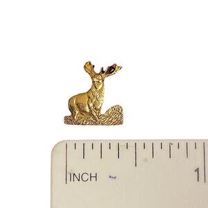 Small gold tone stag lapel pin